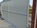 otkatnyie-vorota-doorhan-4900x1600-czvet-ral-9003-belyij-doska-s-avtomatikoj