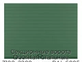 sekczionnyie-vorota-doorhan-stalnyie-3100x2200-czveta-ral-6005-zelyonyij-s-dizajnom-«doska»-s-avtomatikoj